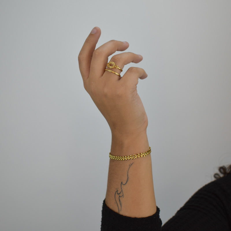 Anel Duplo em Aço Dourado com Fivela